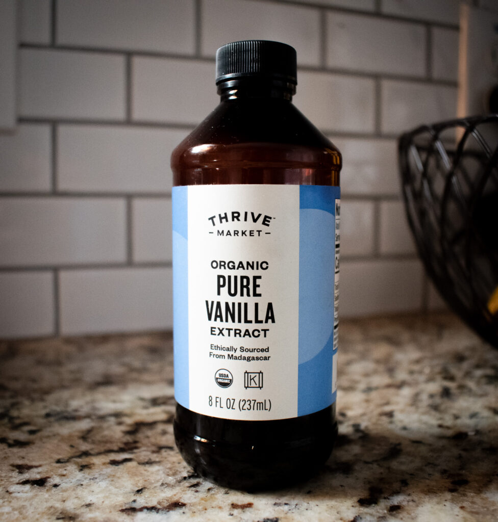 bottle of pure vanilla extract on kitchen counter