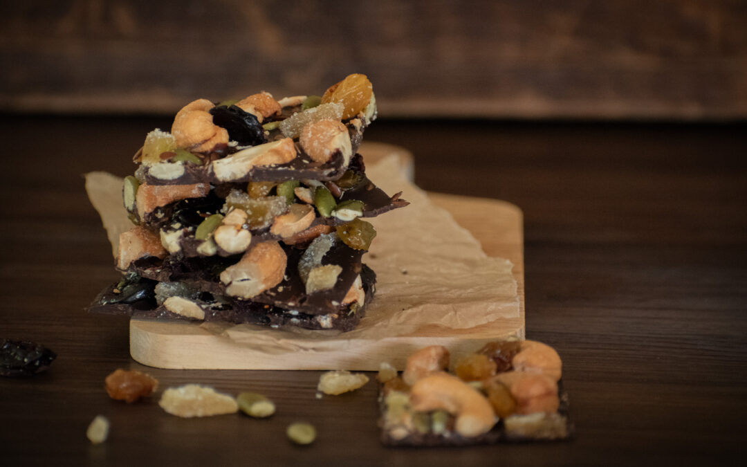 stack of chocolate bark with nuts and dried fruit